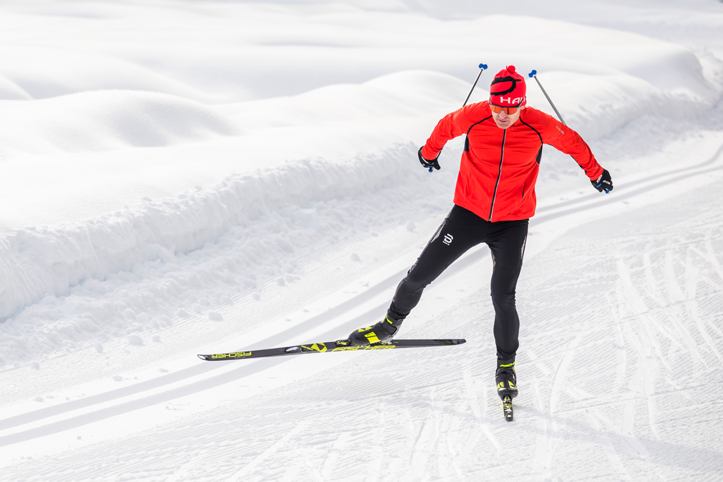 Man cross country skiing in winter scene