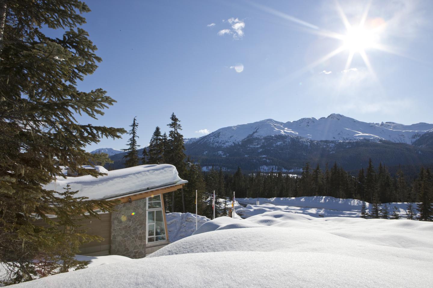 Scenic image of hut with mountains behind