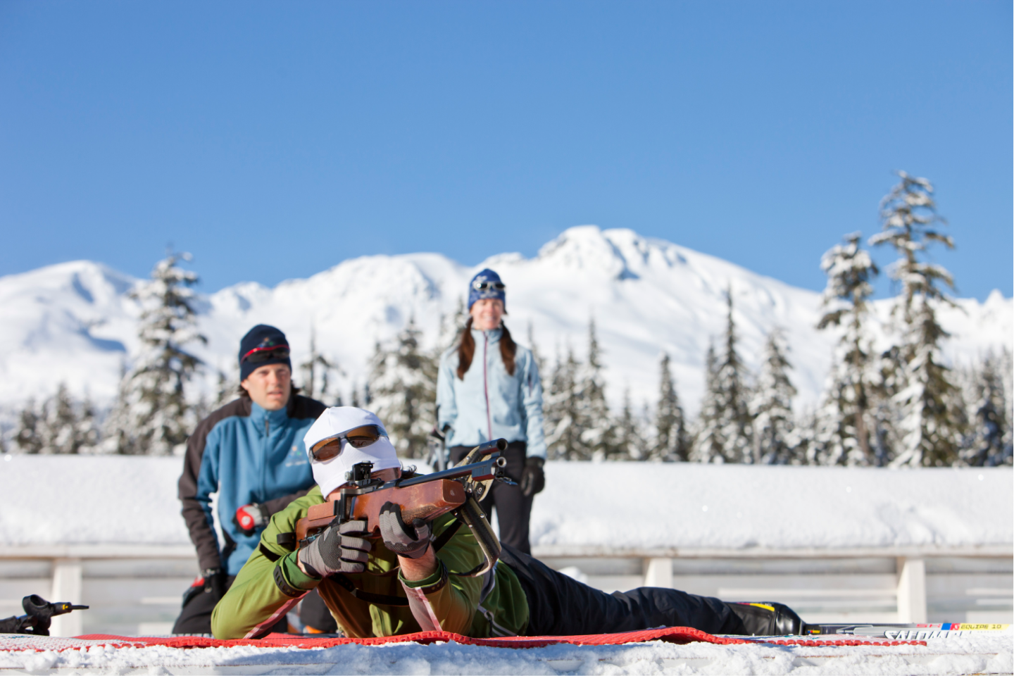 person getting coached in biathlon
