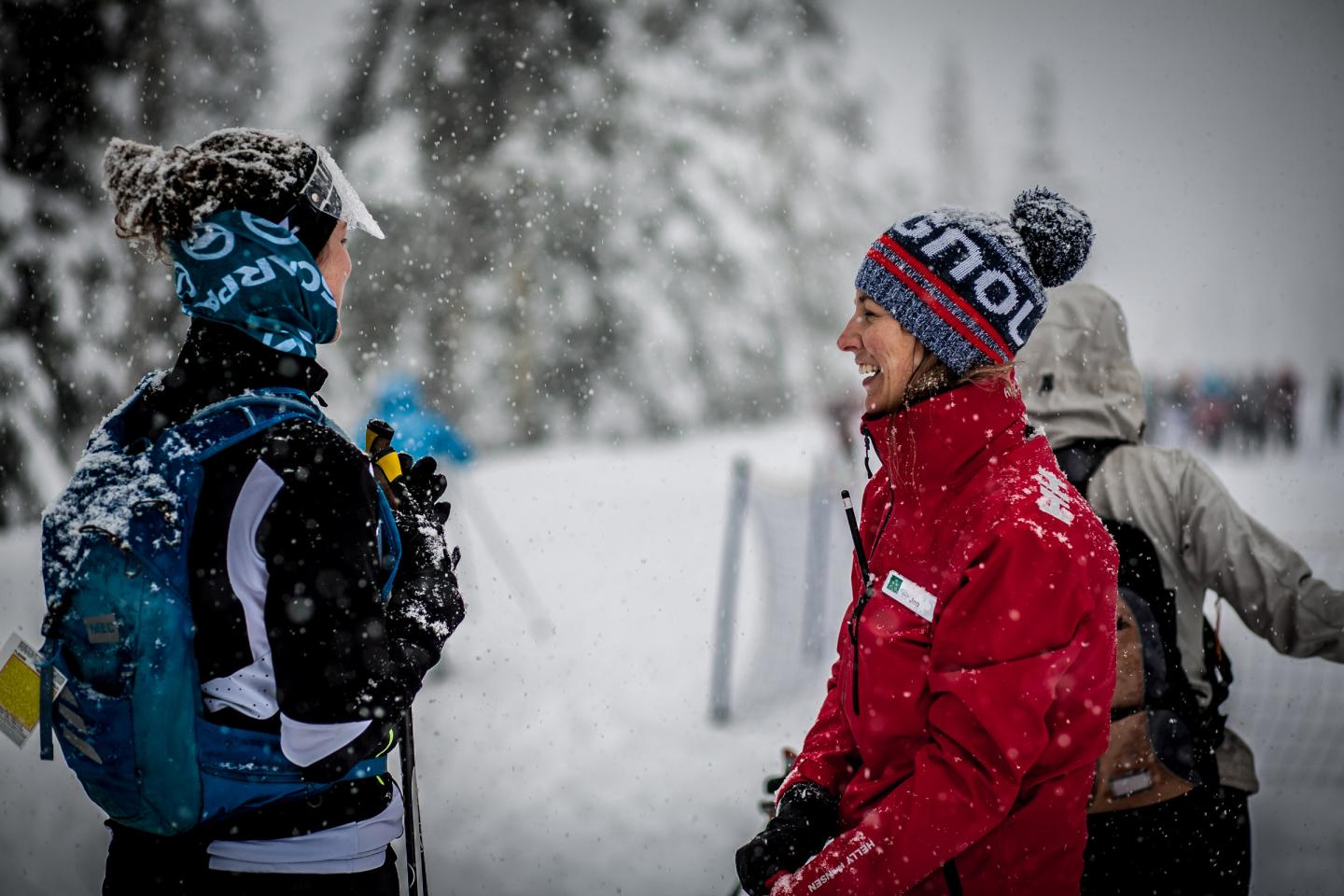 Women standing on XC Ski track