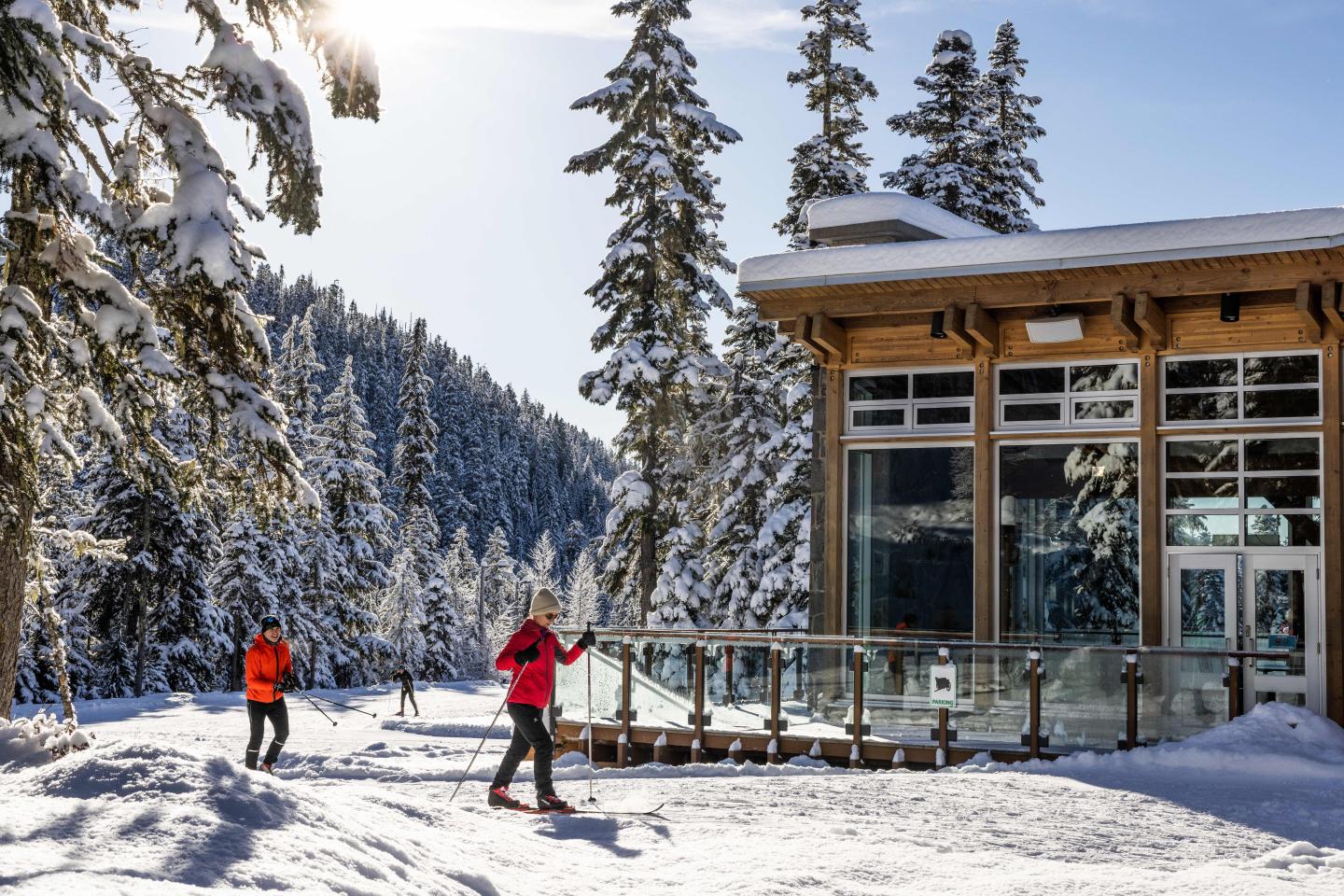Whistler Olympic Park Daylodge Withe skiers in red