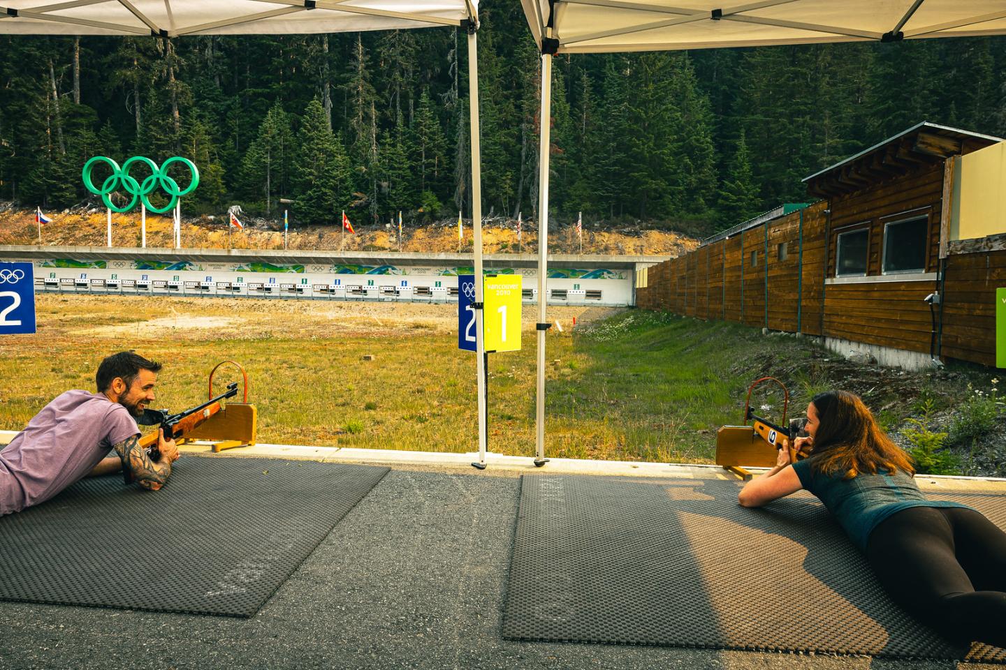People doing biathlon shooting