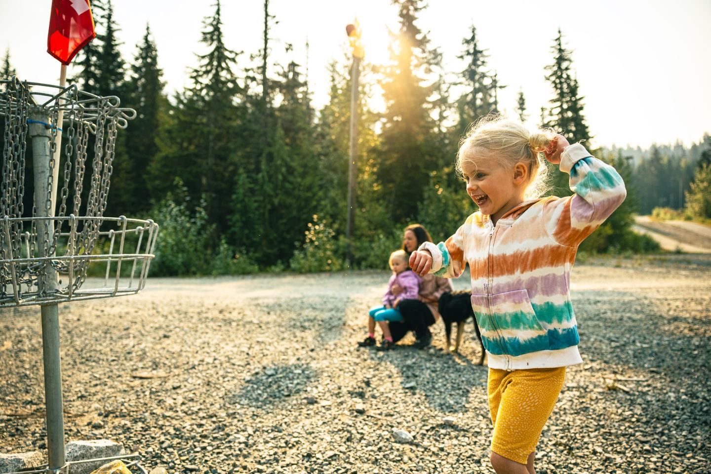 Girl playing desc golf