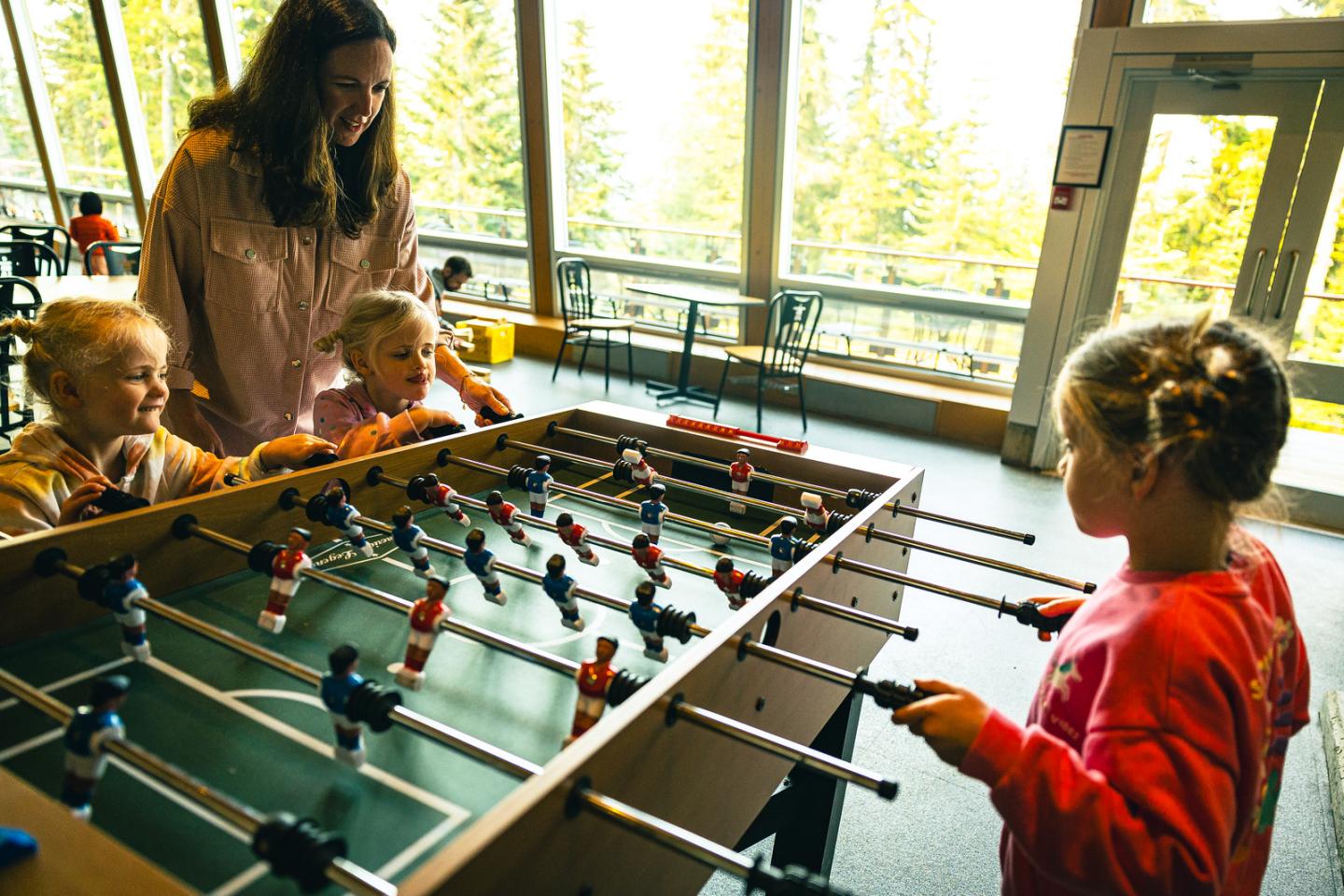 Family playing table football